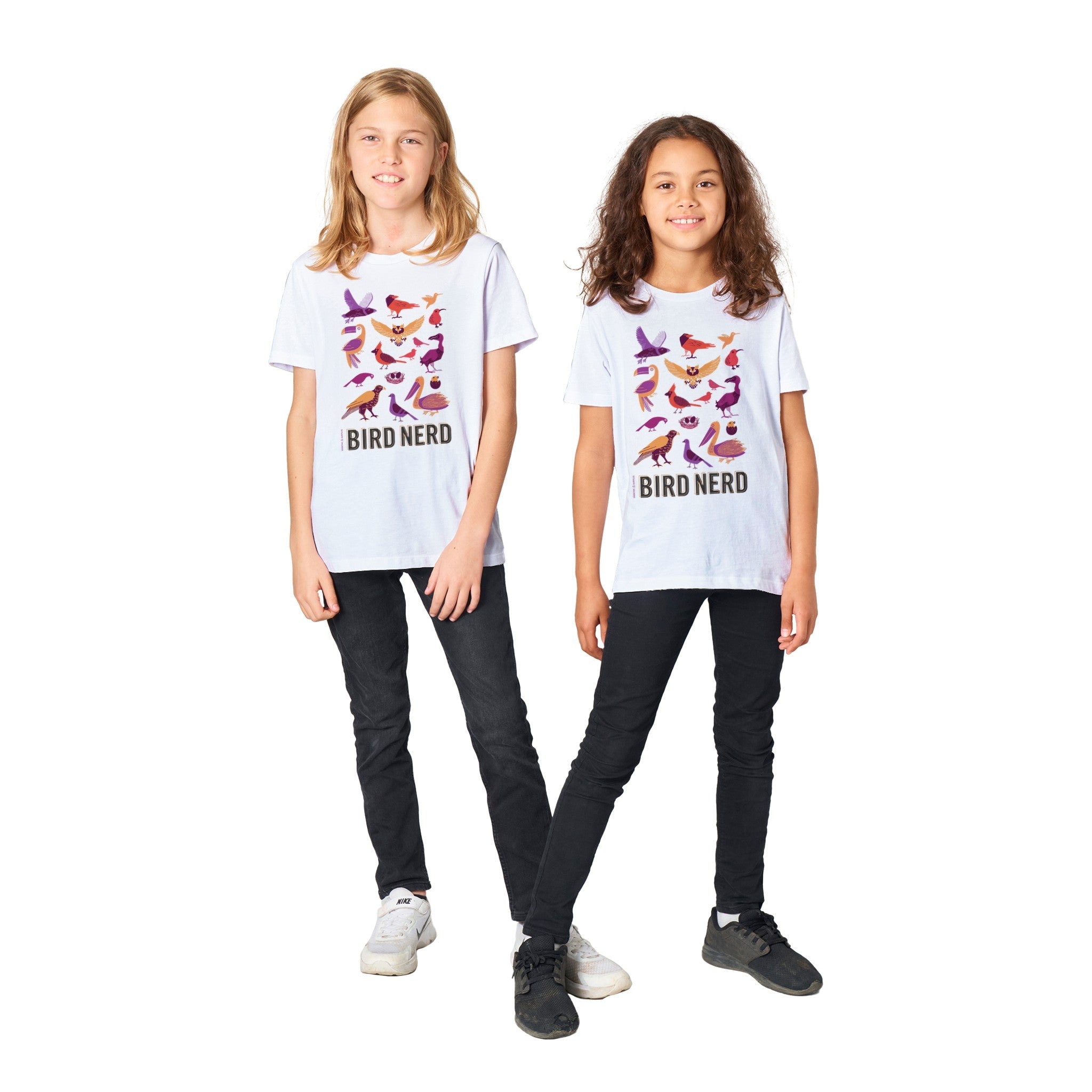 Two children wearing "Bird Nerd" T-shirts with colorful bird illustrations, standing on a white background.