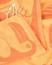 A Feathered Friends: Ornithology Turkish Towel with a bird design on it, made by Cognitive Surplus.