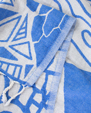 A Cloud Watching Turkish Towel by Cognitive Surplus, with designs on it.